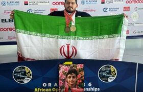 ایزدی مدالهای طلا و برنز خود را به شهید ماکان نصیری اهدا کرد